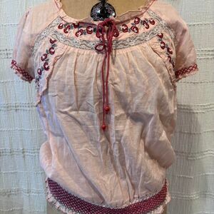 Coral embroidered blouse with lace and beaded details